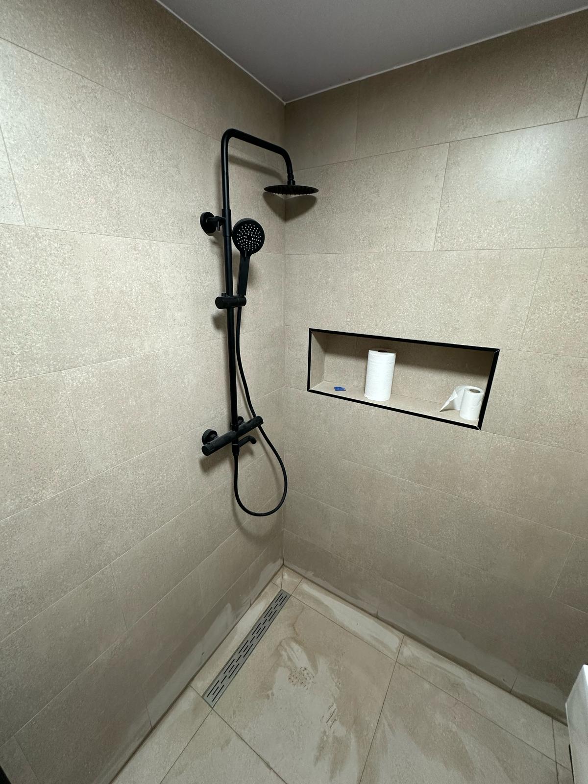 Walk-in shower rooms completed by M&F Heating and Plumbing