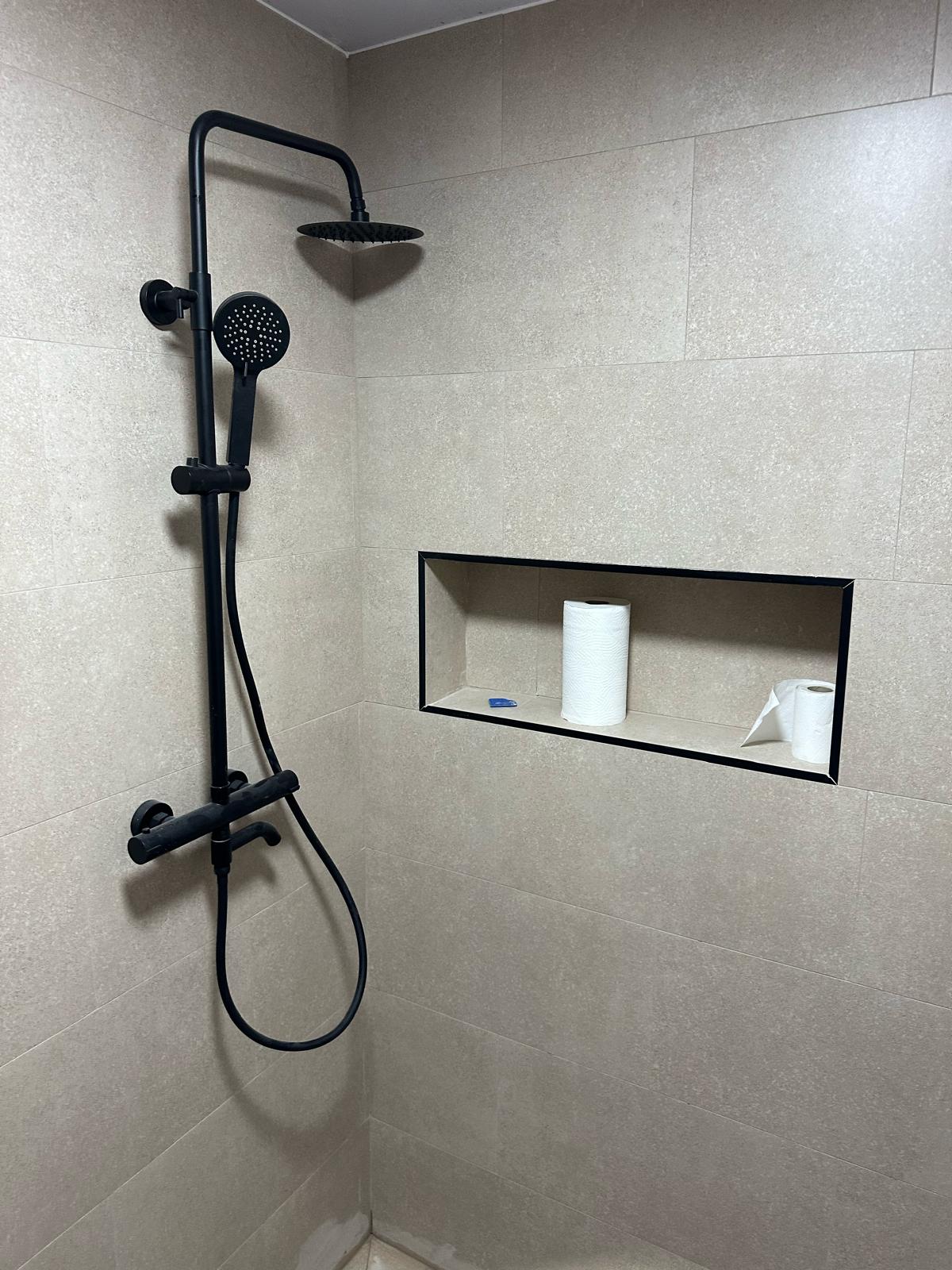 Close detail of finished bathroom tiling